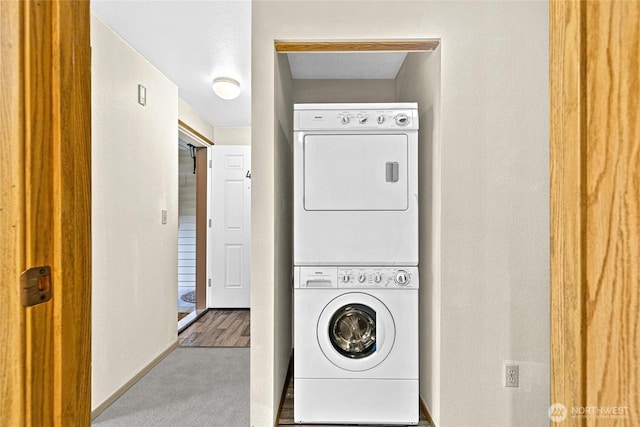 17521 118th Ave SE Unit A-4, Renton, WA 98058 - laundry area with stacked washer and clothes dryer and carpet floors