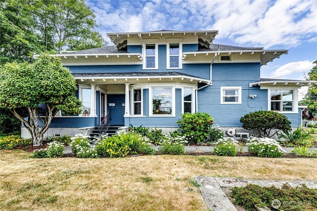231 E 1st St, Port Angeles, WA 98362 - view of front of house featuring a shingled roof and a front lawn