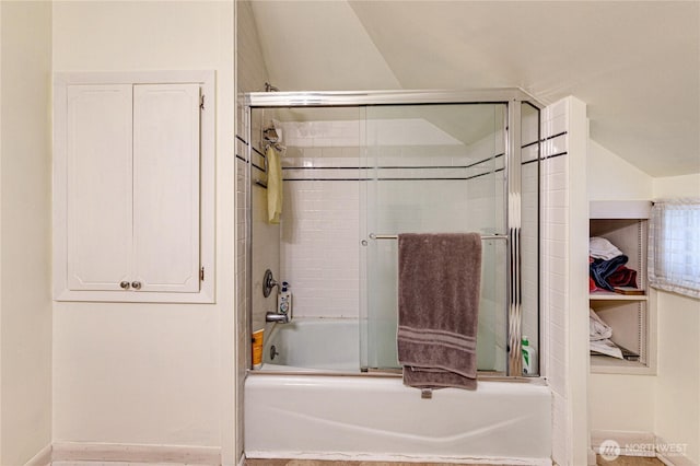 231 E 1st St, Port Angeles, WA 98362 - full bathroom with vaulted ceiling and bath / shower combo with glass door