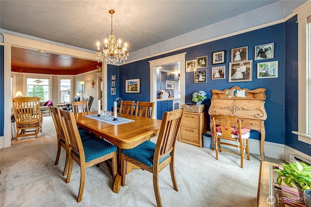 231 E 1st St, Port Angeles, WA 98362 - dining area with light carpet and a chandelier