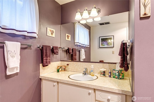 231 E 1st St, Port Angeles, WA 98362 - bathroom with vanity and backsplash