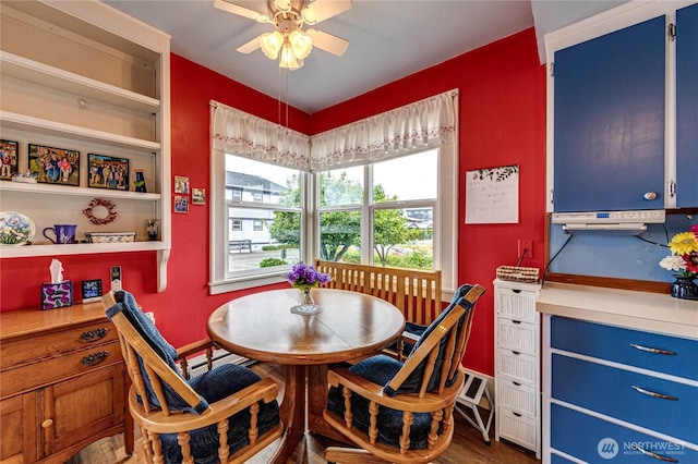 231 E 1st St, Port Angeles, WA 98362 - dining space with ceiling fan and wood finished floors
