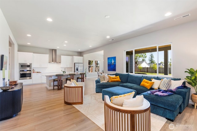 4490 Albatross St, Port Townsend, WA 98368 - living area featuring light wood-type flooring and recessed lighting