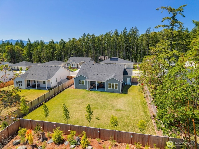 4490 Albatross St, Port Townsend, WA 98368 - view of subject property with a heavily wooded area