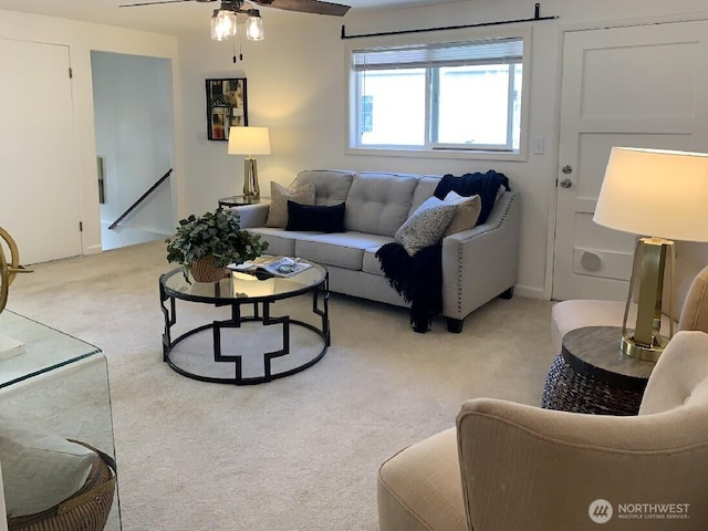 5910 21st Ave SW, Seattle, WA 98106 - living room featuring light colored carpet and ceiling fan