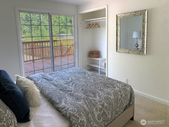5910 21st Ave SW, Seattle, WA 98106 - carpeted bedroom featuring baseboards and access to exterior