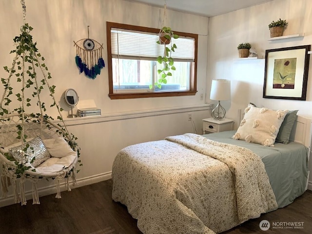 5910 21st Ave SW, Seattle, WA 98106 - bedroom featuring dark wood finished floors and baseboards
