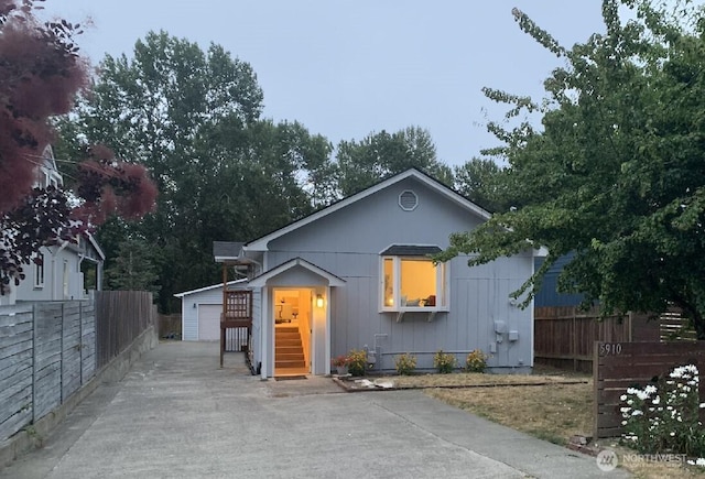 5910 21st Ave SW, Seattle, WA 98106 - view of front of house with an outbuilding and a detached garage