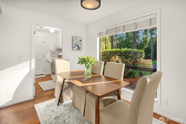 23350 SE 22nd St, Sammamish, WA 98075 - dining area featuring light wood-style flooring and baseboards