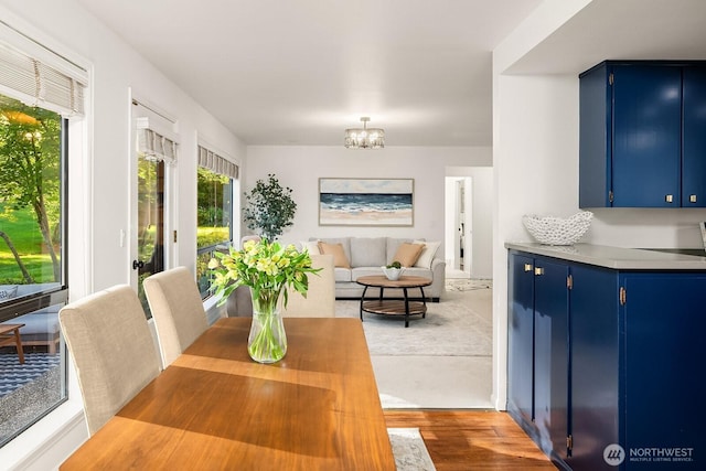 23350 SE 22nd St, Sammamish, WA 98075 - dining space with a chandelier and wood finished floors