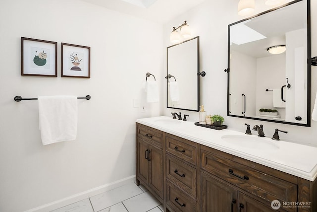 23350 SE 22nd St, Sammamish, WA 98075 - bathroom with double vanity and marble finish flooring