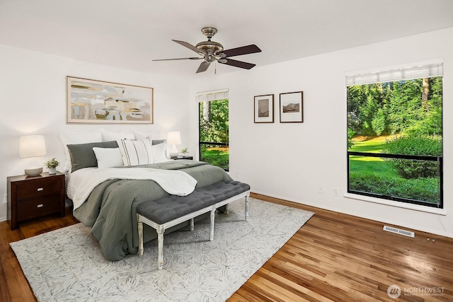 23350 SE 22nd St, Sammamish, WA 98075 - bedroom with wood finished floors and ceiling fan