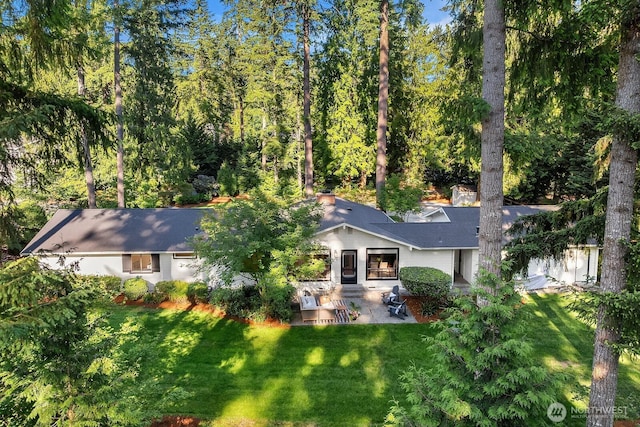 23350 SE 22nd St, Sammamish, WA 98075 - back of property with a patio and a yard