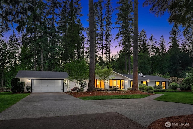 23350 SE 22nd St, Sammamish, WA 98075 - view of front facade with driveway, a garage, and a front yard