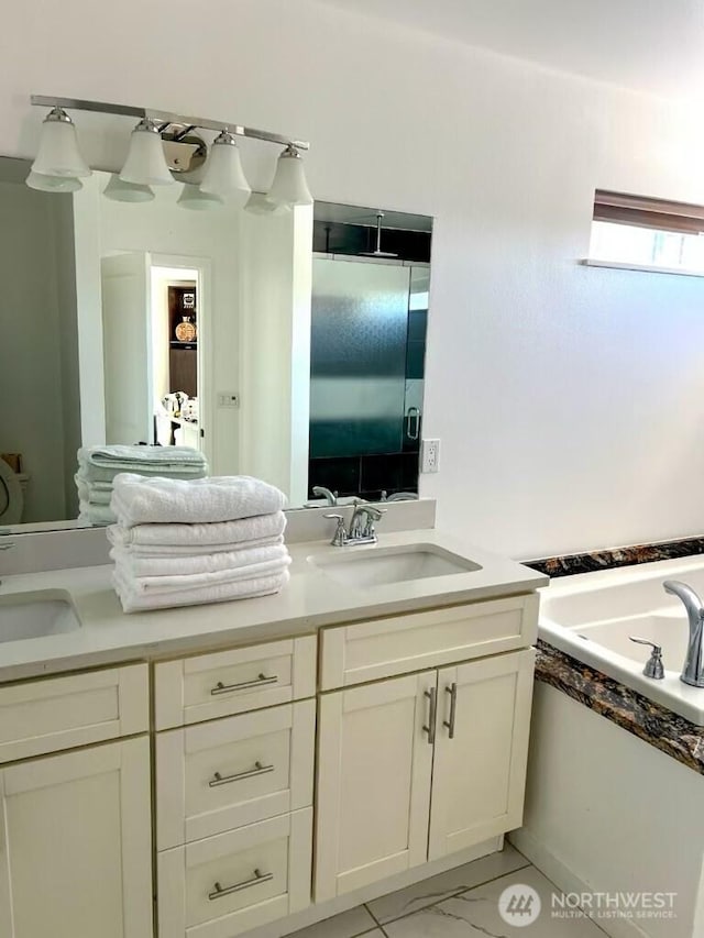 24003 21st Ave S, Des Moines, WA 98198 - full bath featuring double vanity, marble finish floors, and a bathtub