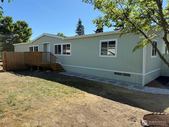 8102 195th St E Unit 95, Spanaway, WA 98387 - rear view of house with a deck