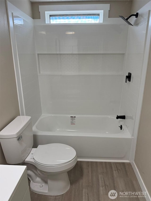 8102 195th St E Unit 95, Spanaway, WA 98387 - full bath with wood finished floors, vanity, and shower / bath combination