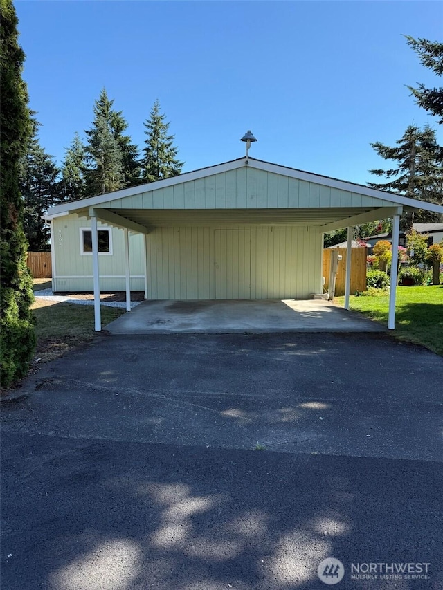 8102 195th St E Unit 95, Spanaway, WA 98387 - exterior space with driveway and a carport