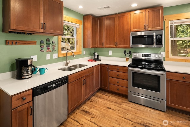 61 Tom And Nita Rd, Cle Elum, WA 98922 - kitchen with appliances with stainless steel finishes, healthy amount of natural light, light wood finished floors, light countertops, and recessed lighting