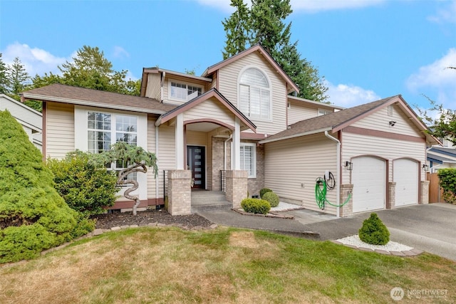 36318 30th Ave S, Federal Way, WA 98003 - view of front of home featuring a garage, asphalt driveway, a front lawn, and a shingled roof