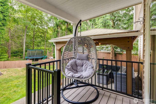 36318 30th Ave S, Federal Way, WA 98003 - wooden deck with a trampoline and an outdoor hangout area