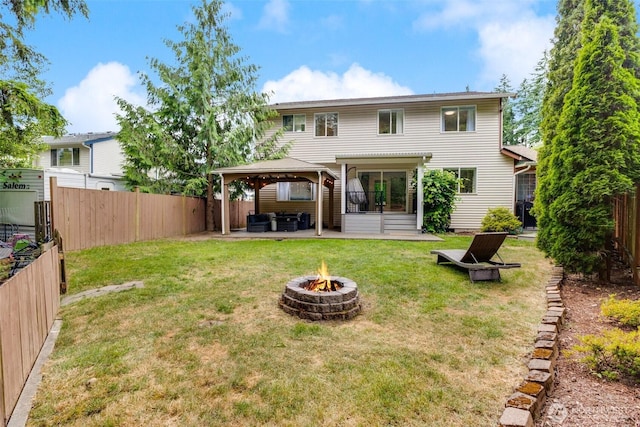 36318 30th Ave S, Federal Way, WA 98003 - rear view of property with an outdoor fire pit, a gazebo, a patio, and a fenced backyard