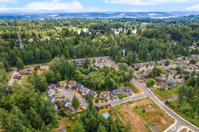 36318 30th Ave S, Federal Way, WA 98003 - aerial view of property and surrounding area featuring a heavily wooded area and nearby suburban area