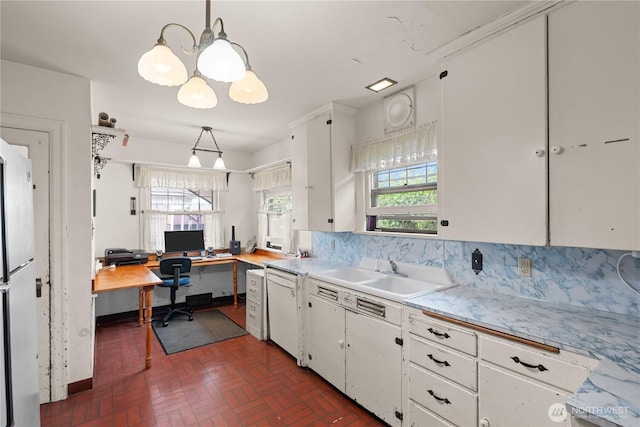 235 S 59th St, Tacoma, WA 98408 - kitchen with white cabinets, plenty of natural light, light countertops, and an office area
