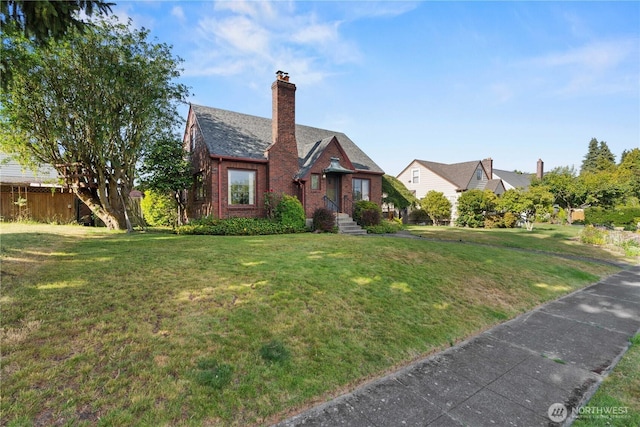 235 S 59th St, Tacoma, WA 98408 - tudor house with brick siding and a chimney