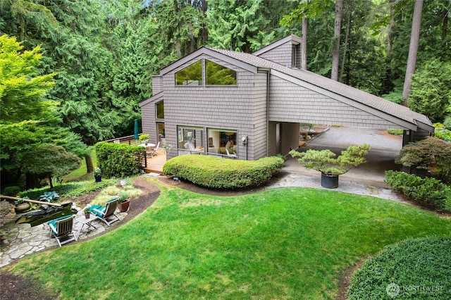 22526 53rd Ave SE, Bothell, WA 98021 - rear view of property featuring a lawn and a wooden deck