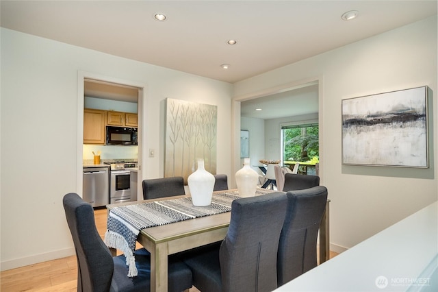 22526 53rd Ave SE, Bothell, WA 98021 - dining area with light wood-style flooring and recessed lighting