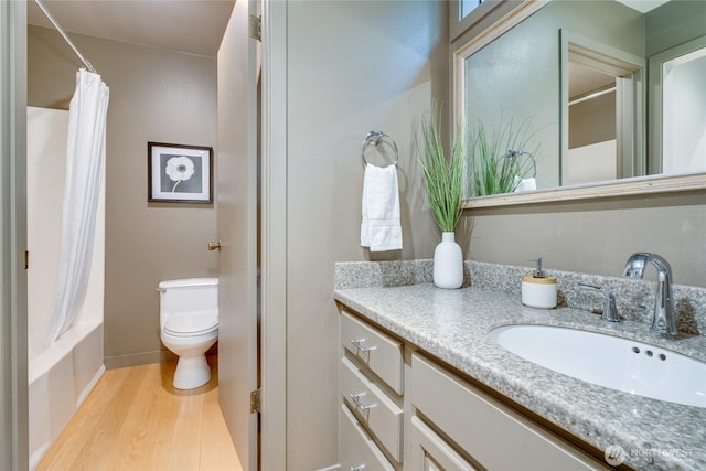 22526 53rd Ave SE, Bothell, WA 98021 - full bathroom featuring vanity, wood finished floors, and shower / bath combo with shower curtain