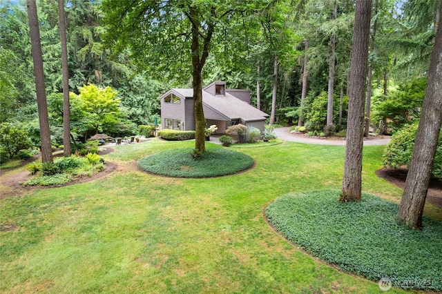 22526 53rd Ave SE, Bothell, WA 98021 - view of grassy yard featuring a wooded view