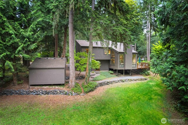 22526 53rd Ave SE, Bothell, WA 98021 - back of property with a wooden deck, a shed, and a yard