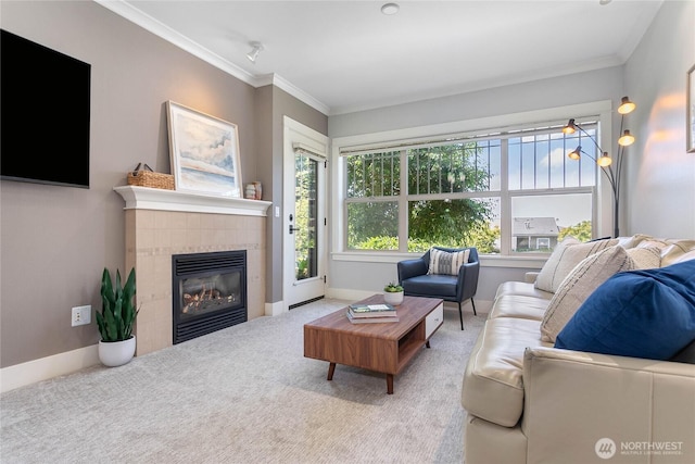 1000 High St Unit 102, Bellingham, WA 98225 - carpeted living room featuring a tile fireplace and crown molding