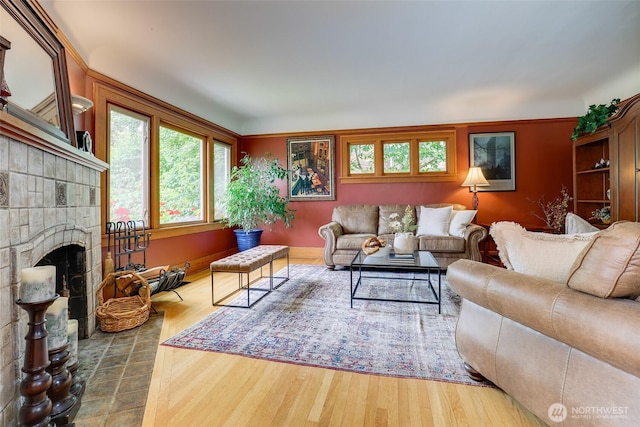 2463 26th Ave E, Seattle, WA 98112 - living room featuring wood finished floors and a fireplace with raised hearth