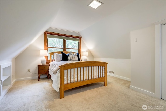 2463 26th Ave E, Seattle, WA 98112 - carpeted bedroom featuring baseboards and vaulted ceiling