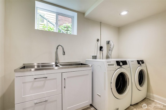 2463 26th Ave E, Seattle, WA 98112 - laundry area featuring cabinet space, washing machine and dryer, and recessed lighting