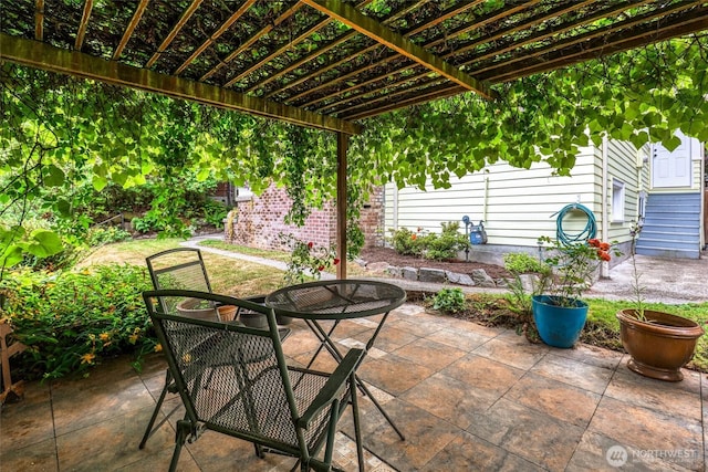 2463 26th Ave E, Seattle, WA 98112 - view of patio / terrace featuring outdoor dining space and a pergola