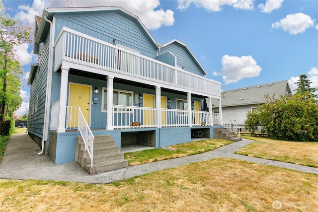 3572-3574 E F St, Tacoma, WA 98404 - view of front of property with a porch, a front yard, and a balcony