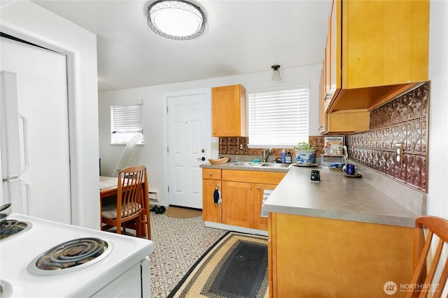 3572-3574 E F St, Tacoma, WA 98404 - kitchen featuring white electric range oven, decorative backsplash, fridge, light flooring, and light countertops