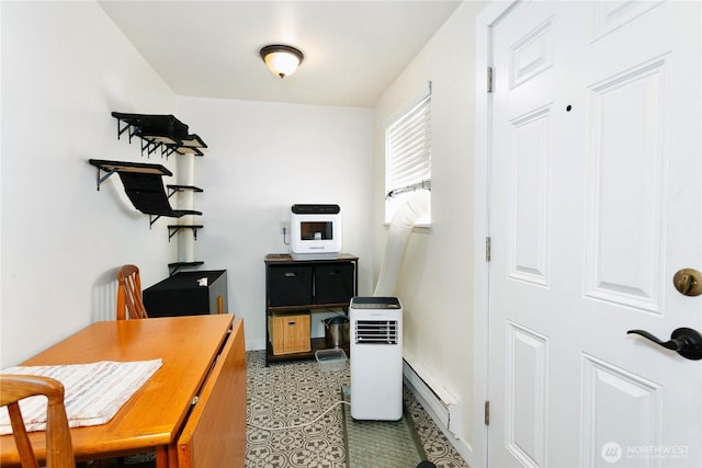 3572-3574 E F St, Tacoma, WA 98404 - office area featuring a baseboard radiator and baseboards