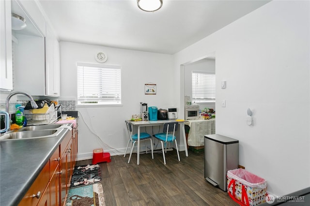 3572-3574 E F St, Tacoma, WA 98404 - kitchen with dark wood-style floors and brown cabinets