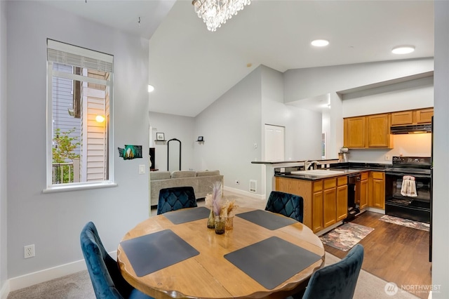 5809 Highway Pl Unit B304, Everett, WA 98203 - dining area with vaulted ceiling and recessed lighting