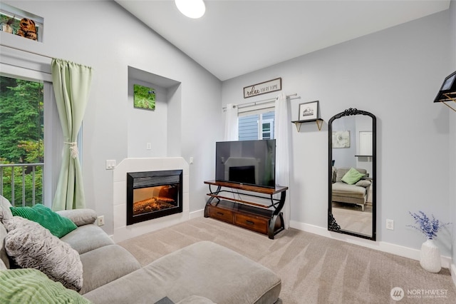 5809 Highway Pl Unit B304, Everett, WA 98203 - carpeted living area with lofted ceiling and a tile fireplace