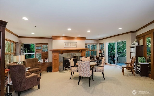 1750 152nd Ave NE Unit C310, Bellevue, WA 98007 - dining area featuring crown molding, a fireplace, light colored carpet, and recessed lighting