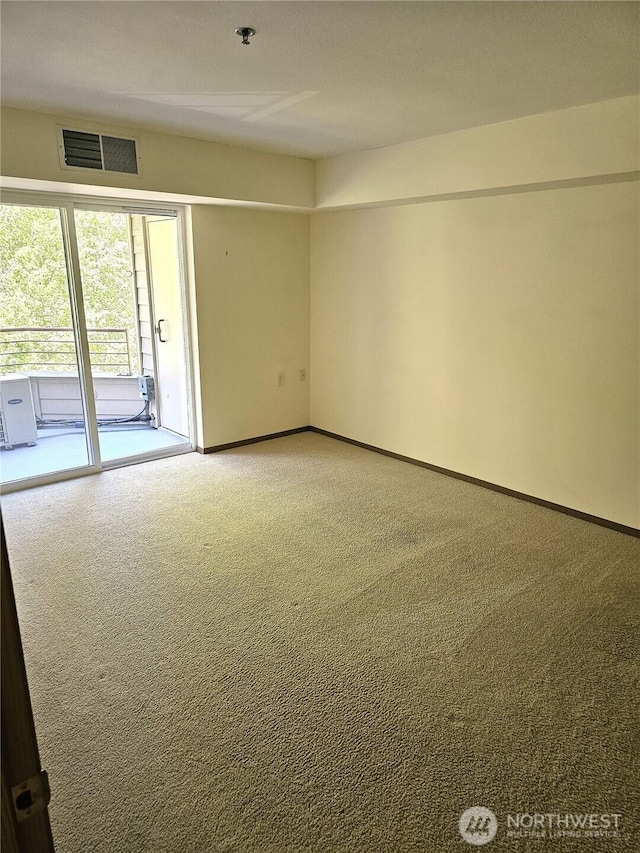 1750 152nd Ave NE Unit C310, Bellevue, WA 98007 - spare room featuring light colored carpet and fire sprinkler in ceiling