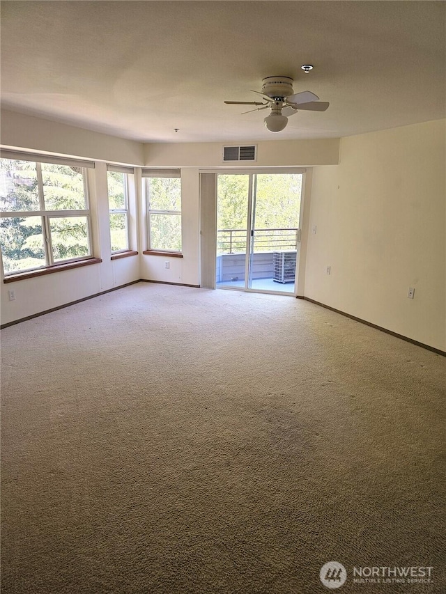 1750 152nd Ave NE Unit C310, Bellevue, WA 98007 - spare room with ceiling fan, carpet flooring, and fire sprinkler in ceiling