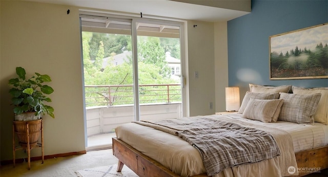 1750 152nd Ave NE Unit C310, Bellevue, WA 98007 - bedroom with access to exterior and light carpet