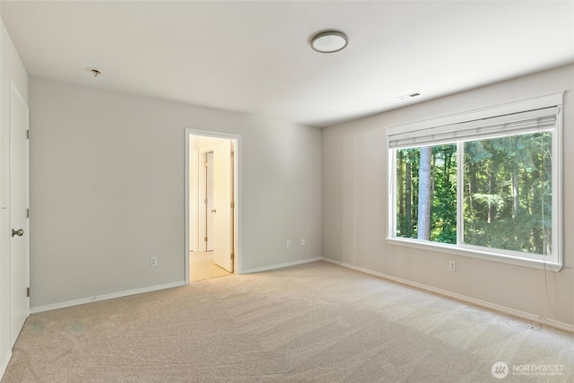 12904 159th St E, Puyallup, WA 98374 - unfurnished room with light carpet and baseboards